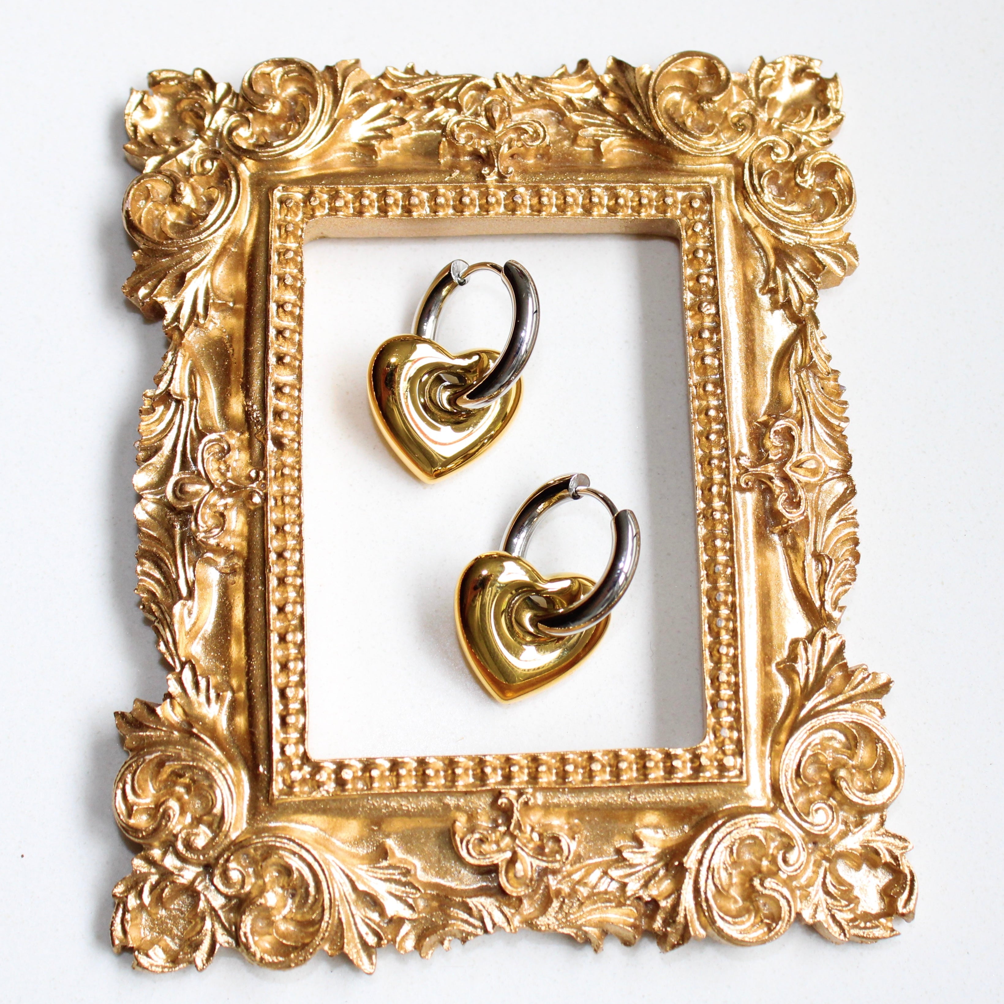 ARETES BICOLOR CORAZÓN PAR