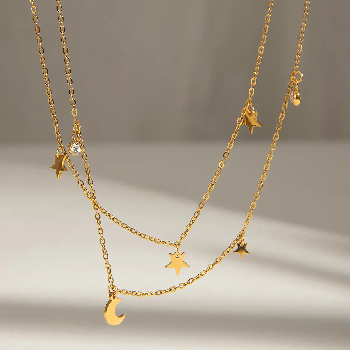 COLLAR DOBLE ESTRELLAS Y LUNA