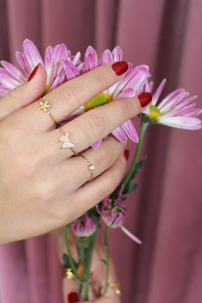 SET DE TRES ANILLOS (FLOR, CIRCONITA Y MARIPOSA)