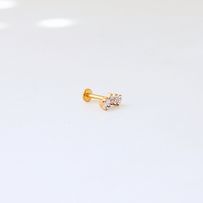 LABRET EN TITANIO DORADO CON CINCO CIRCONITAS