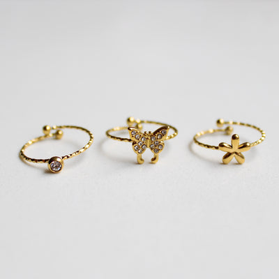 SET DE TRES ANILLOS (FLOR, CIRCONITA Y MARIPOSA)