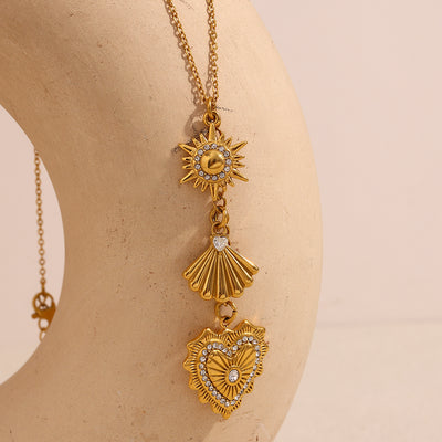 COLLAR CON TRES DIJES DORADOS