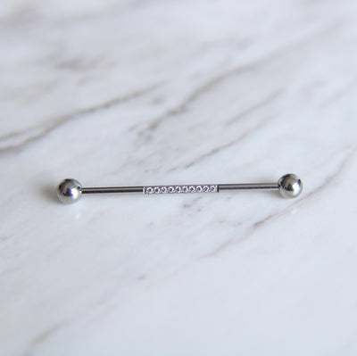 Industrial piercing with row of zircons